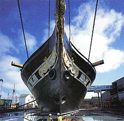 colour photo showing the front of an iron steamship