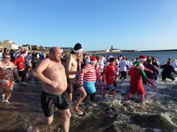 Hundreds gather in the sea